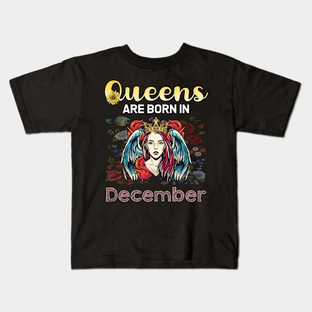 Queen Fire December Kids T-Shirt by symptomovertake